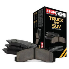 Load image into Gallery viewer, StopTech 09-18 Dodge Ram Truck &amp; SUV Semi-Metallic Front Brake Pads
